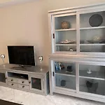Elegant 2-Bedroom Apartment In Benidorm With Private Pool And Scenic Garden Views
